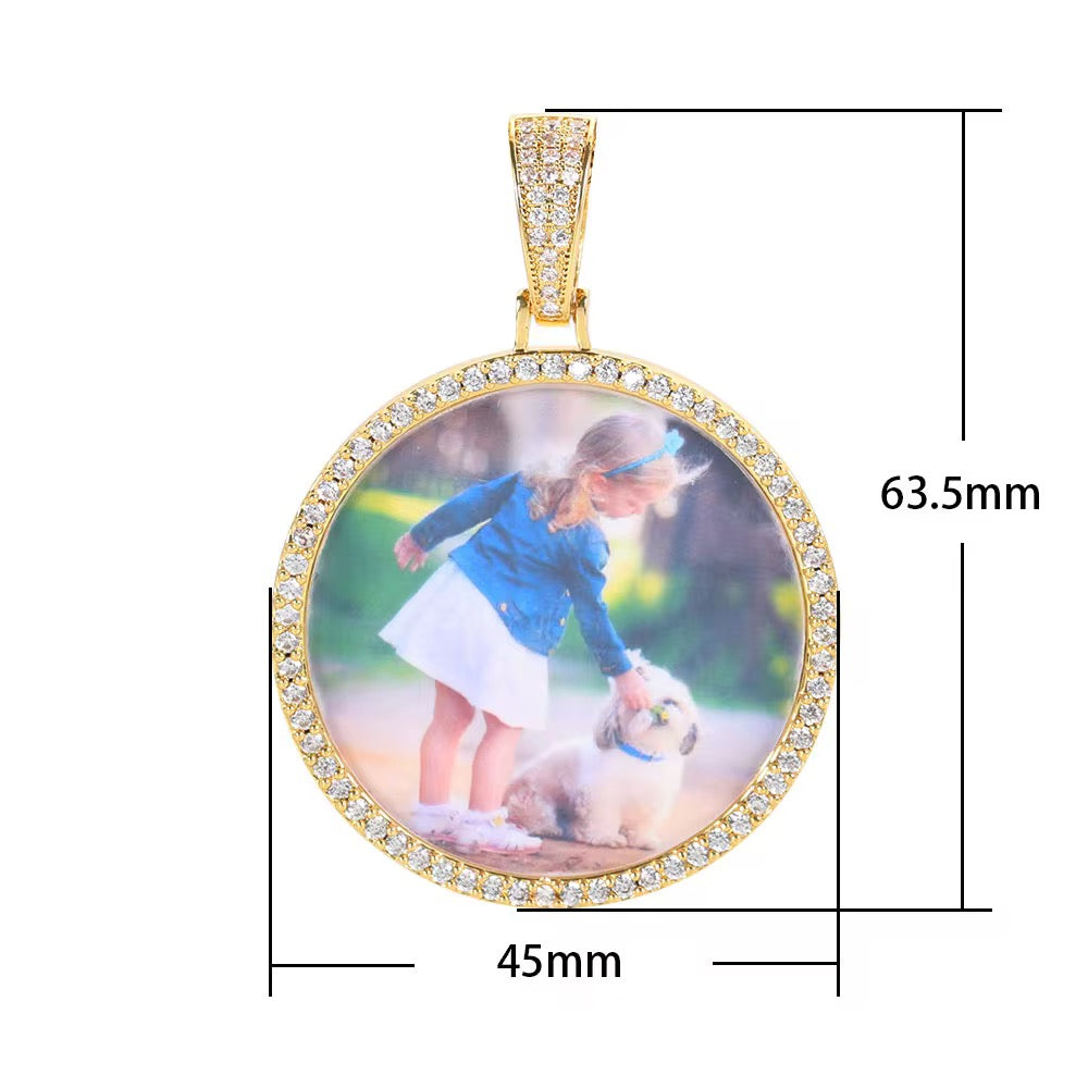 Portaretrato circular bañado en oro de 18k